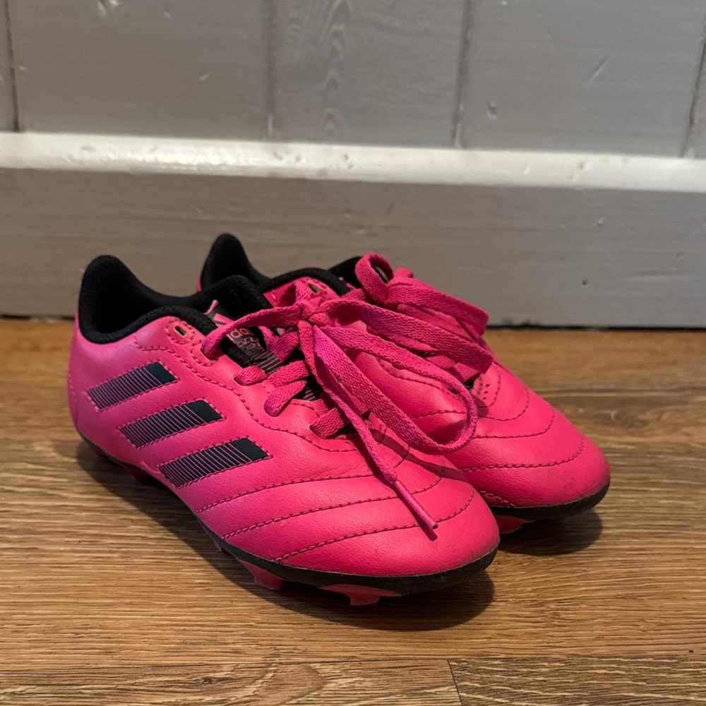 Youth Adidas Fuchsia Soccer Cleats with Black Stripes